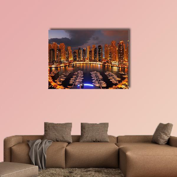 Dubai Marina at Dusk Canvas Wall Art in orange, yellow and blue, single panel hung on a wall