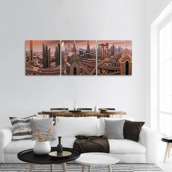 Dubai Skyline at Sunset Panoramic Canvas Wall Art in beige, brown and orange, hung on a wall
