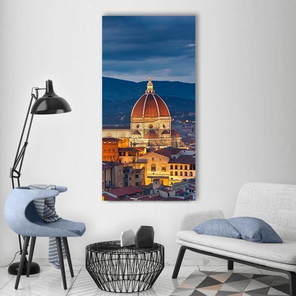 Duomo of Florence at Dusk Vertical Canvas Wall Art in brown, orange and blue, single vertical panel hung on a wall