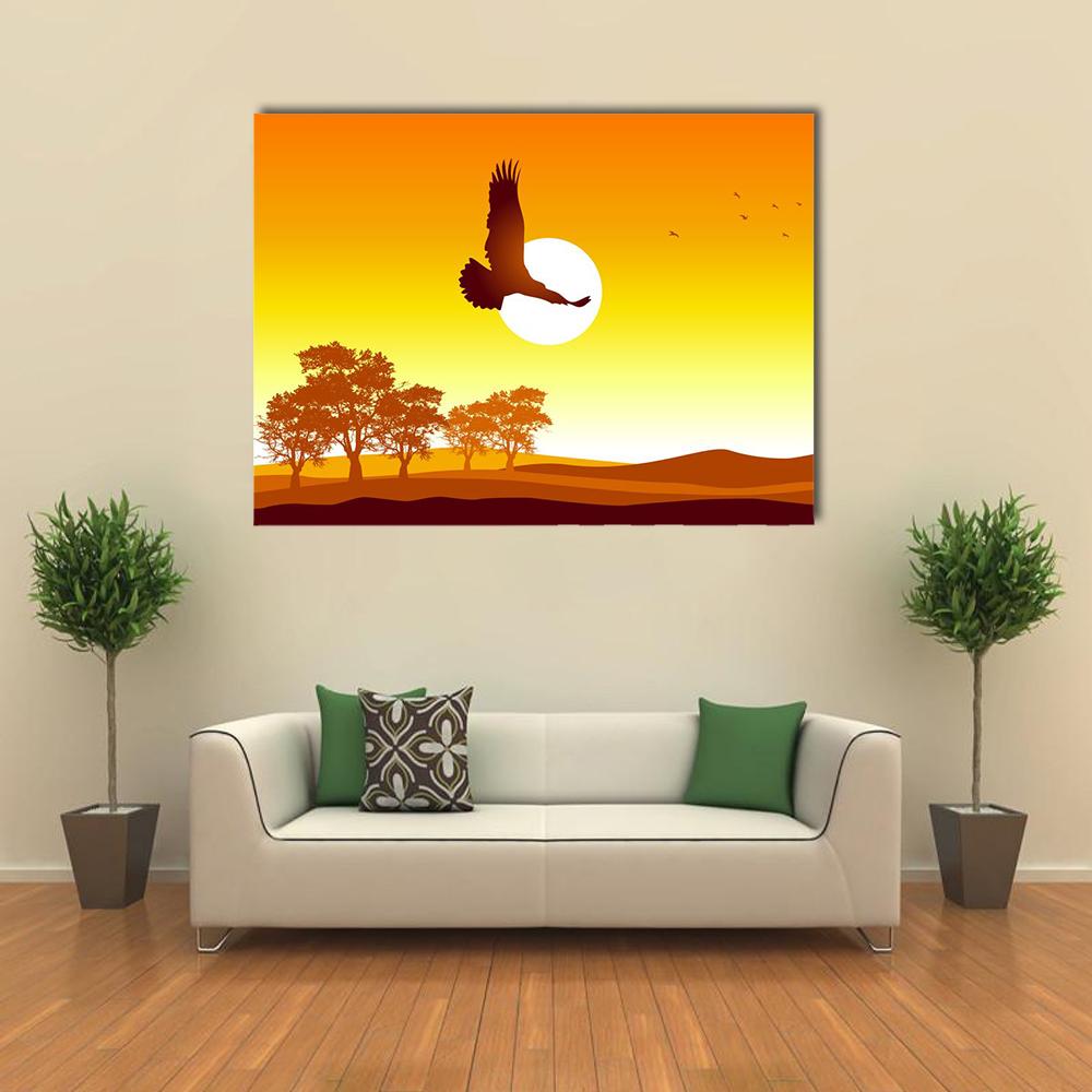 Eagle Flying at Sunrise Canvas Wall Art in brown, orange and yellow, single panel hung on a wall