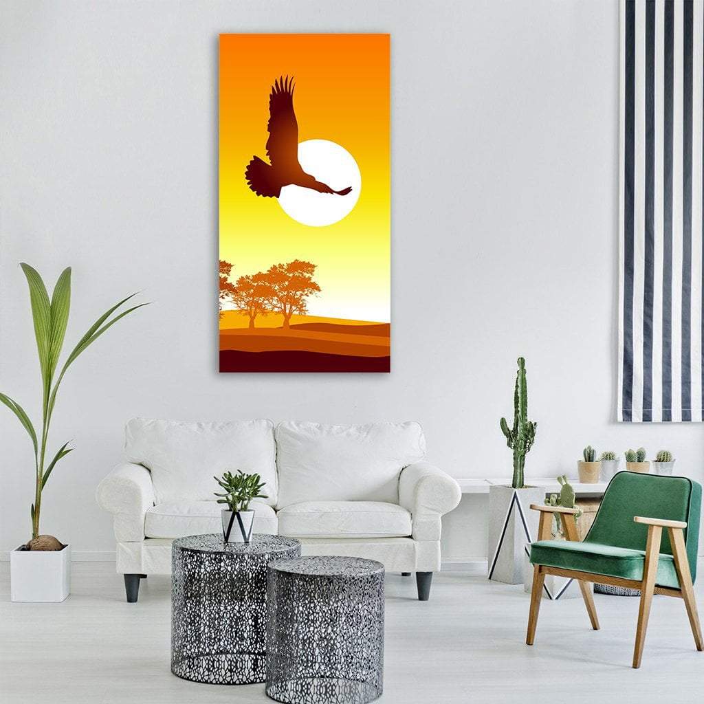Eagle Flying at Sunrise Vertical Canvas Wall Art in brown, orange and yellow, single vertical panel hung on a wall