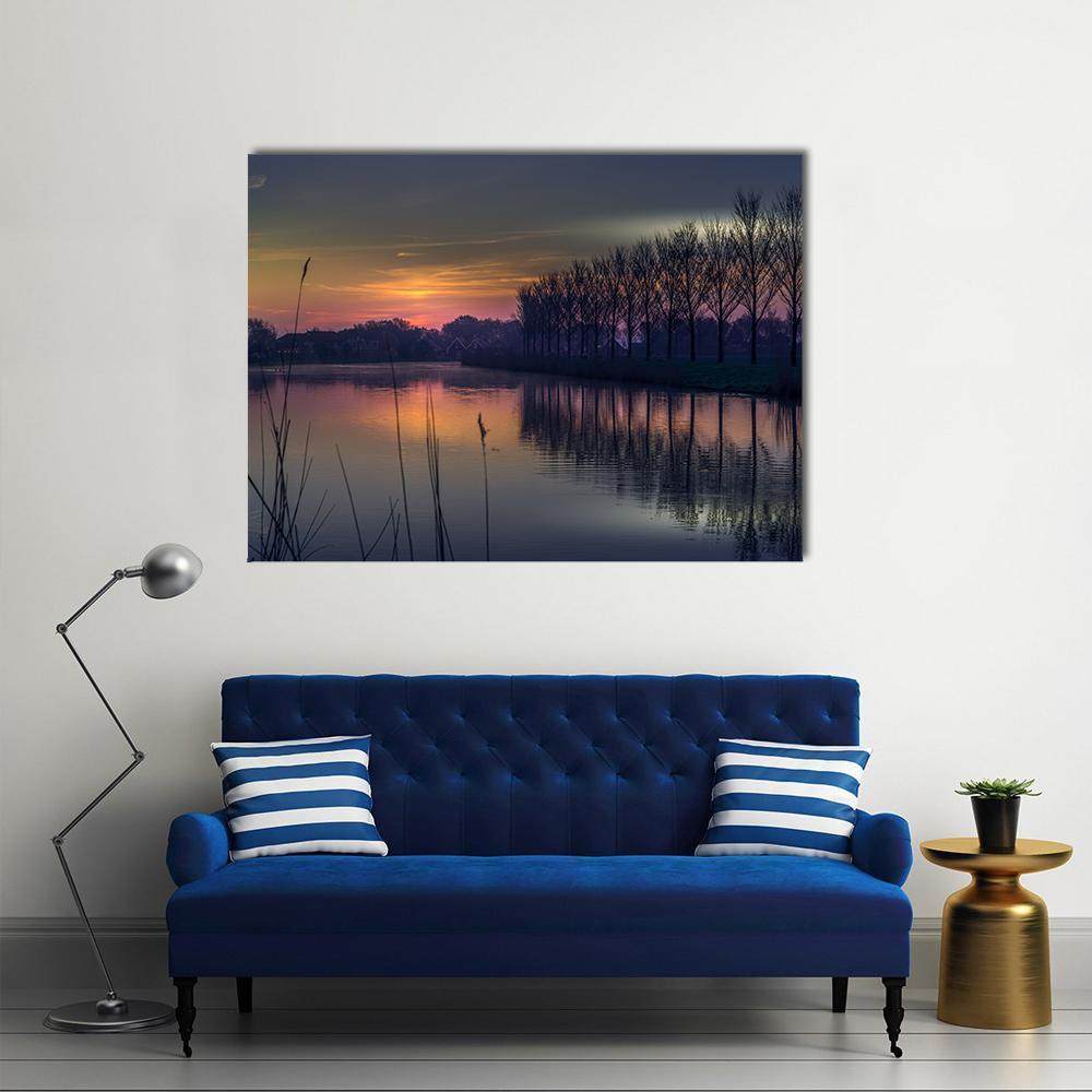 Early Morning by a Canal Canvas Wall Art in orange, yellow and blue, single panel hung on a wall