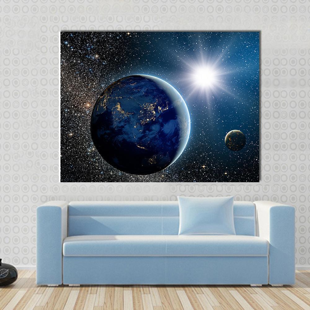 Earth &amp; Sun from Space Canvas Wall Art in black, white and blue, single panel hung on a wall