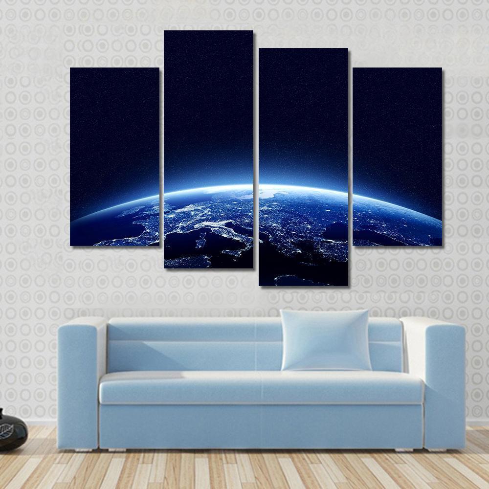 Earth at Night Canvas Wall Art in black and blue, 4 panel Pop layout hung on a wall