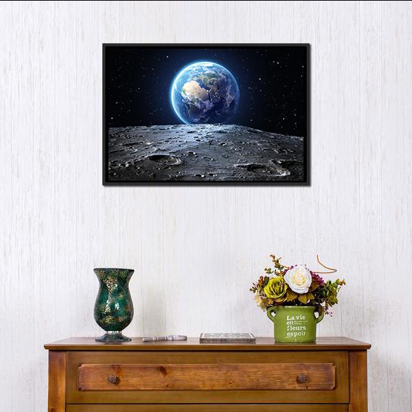 Earth from Moon Surface Canvas Wall Art in black, gray and blue, framed canvas, product view on a white background