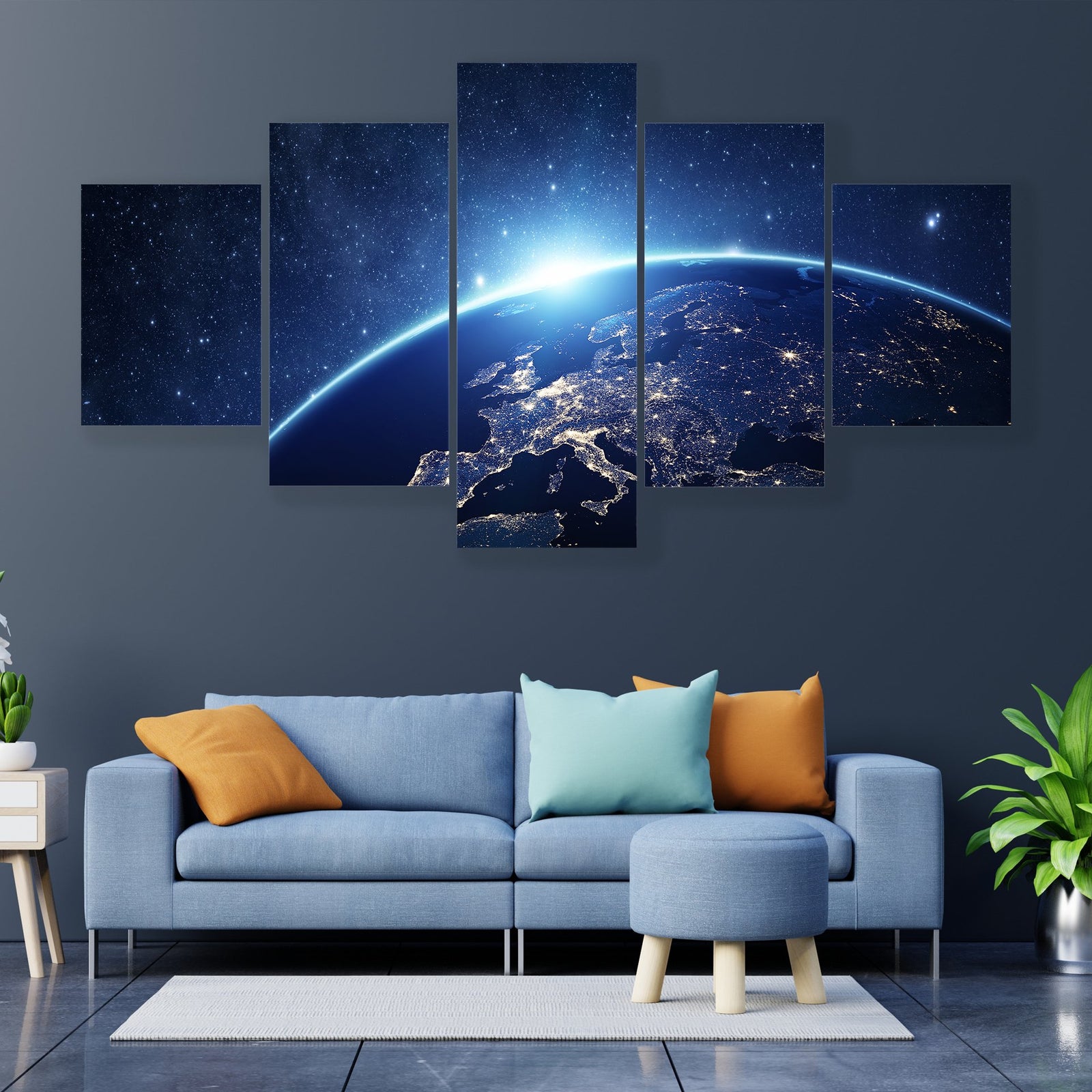 Earth from Space Canvas Wall Art in black and blue, 5 panel Star layout hung on a wall
