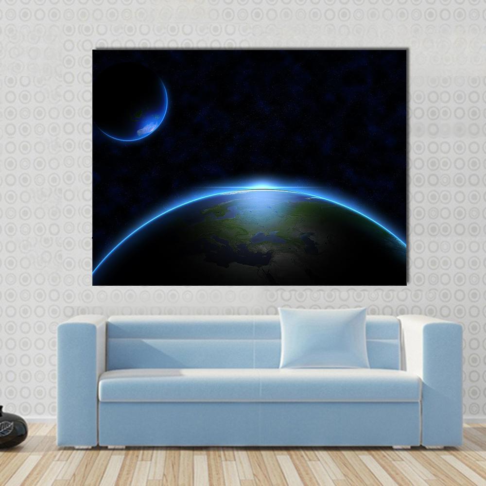 Earth in Space Canvas Wall Art in black and blue, single panel hung on a wall