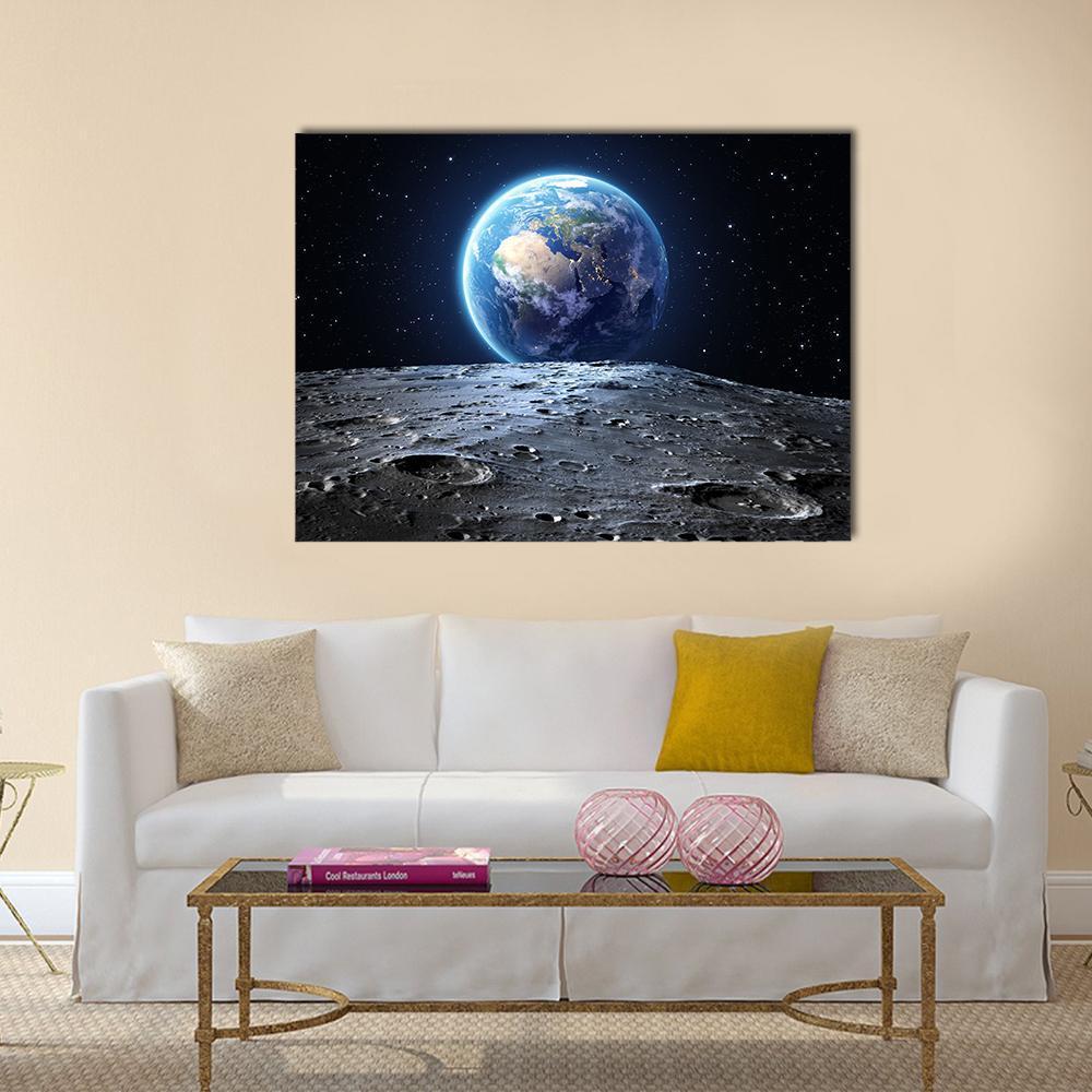 Earth from Moon Surface Canvas Wall Art in black, gray and blue, single panel hung on a wall