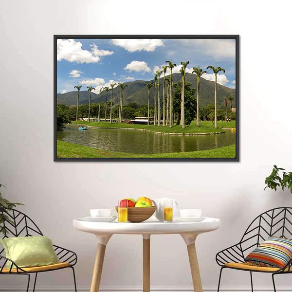 Palm-lined Mountain Lake with Two Boats Canvas Wall Art in brown, green and blue, framed canvas, product view on a white background