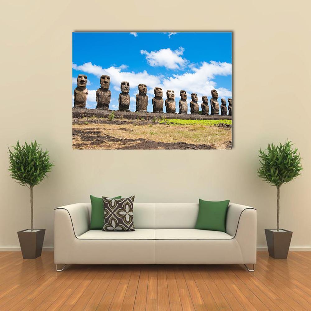 Moai Statues on Easter Island, Chile Canvas Wall Art in gray, brown and blue, single panel hung on a wall