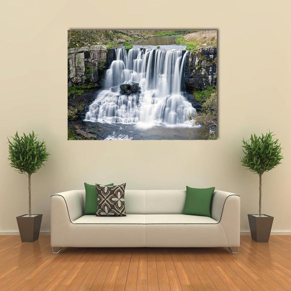 Ebor Falls, Australia Tiered Waterfall Canvas Wall Art in white, gray and green, single panel hung on a wall