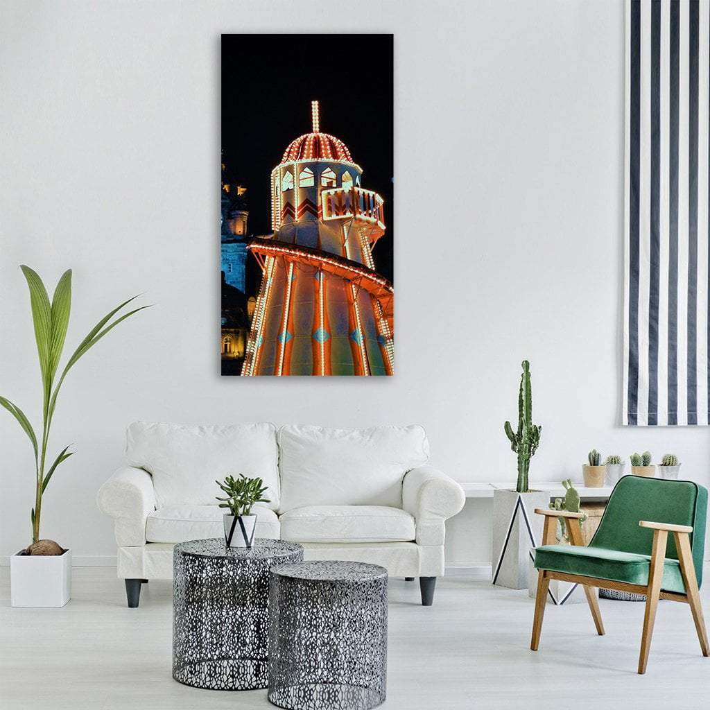 Christmas Helter-skelter with Night Lights Vertical Canvas Wall Art in black, orange and yellow, single vertical panel hung on a wall