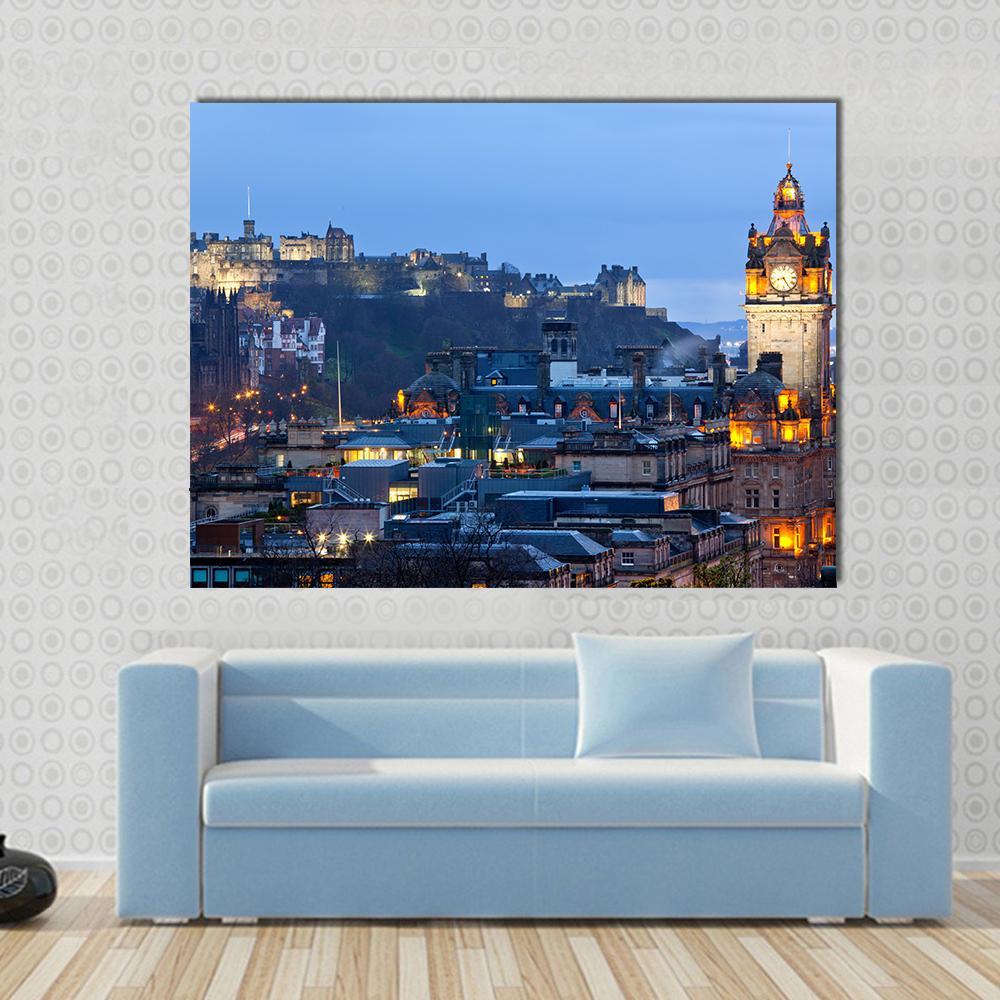 Edinburgh Castle Canvas Wall Art in black, orange and blue, single panel hung on a wall