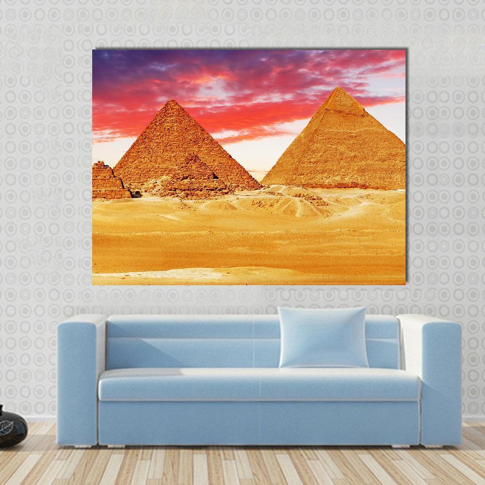 Egyptian Pyramids Canvas Wall Art in red, orange and yellow, single panel hung on a wall