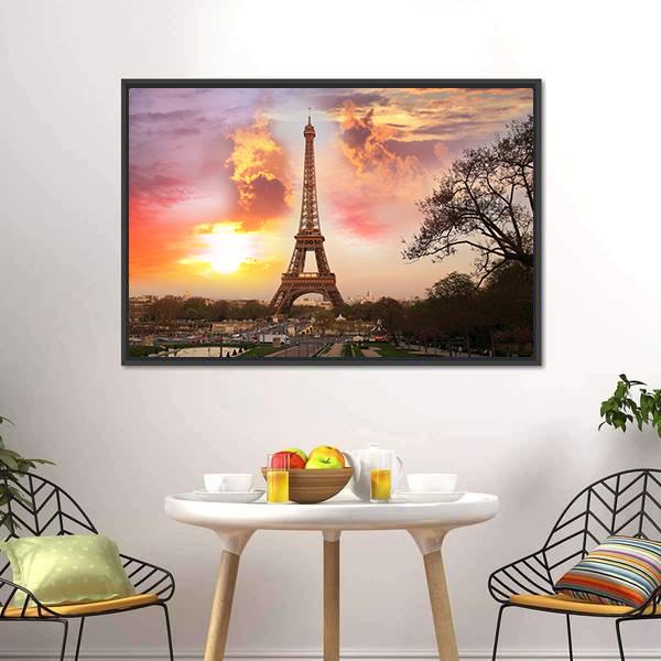 Eiffel Tower Against Sunset Canvas Wall Art in orange, yellow and pink, framed canvas, product view on a white background