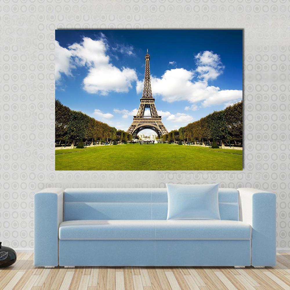 Eiffel Tower Paris Canvas Wall Art in white, green and blue, single panel hung on a wall