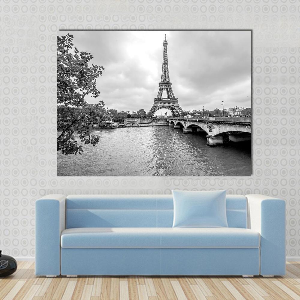 Eiffel Tower from Seine River Canvas Wall Art in black, white and gray, 5 panel Pop layout hung on a wall