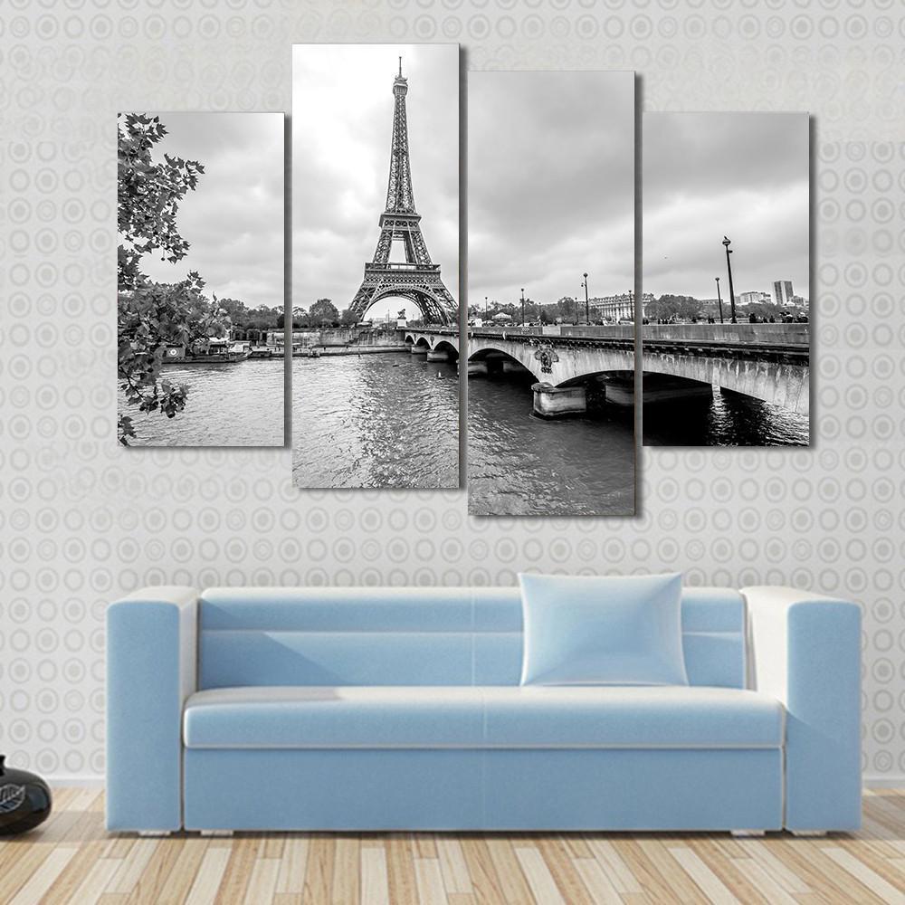 Eiffel Tower from Seine River Canvas Wall Art in black, white and gray, 5 panel Pop layout hung on a wall