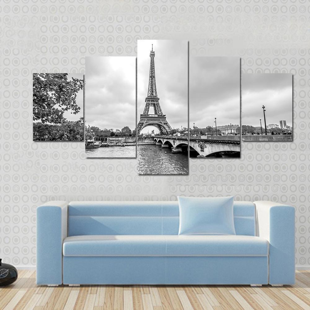 Eiffel Tower from Seine River Canvas Wall Art in black, white and gray, 5 panel Pop layout hung on a wall