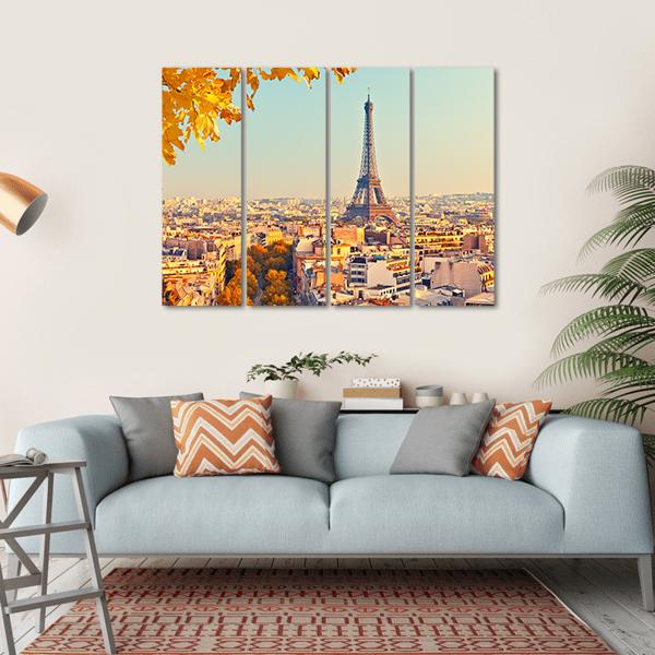 Eiffel Tower with Golden Autumn Foliage Canvas Wall Art in gold, yellow and blue, hung on a wall