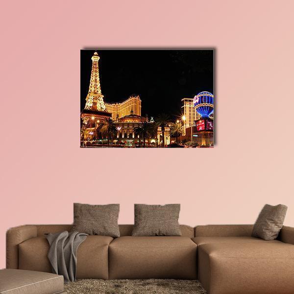 Eiffel Tower Replica on Las Vegas Strip Canvas Wall Art in black, gold and yellow, single panel hung on a wall