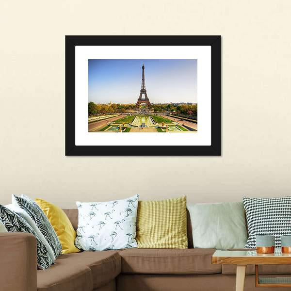 Eiffel Tower in Paris Canvas Wall Art in yellow, green and blue, framed print, product view on a white background