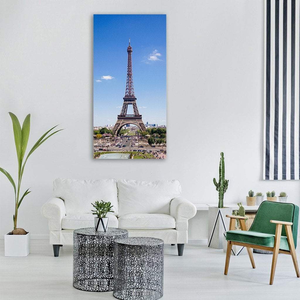 Eiffel Tower and Paris Skyline Vertical Canvas Wall Art in gray, brown and blue, single vertical panel hung on a wall