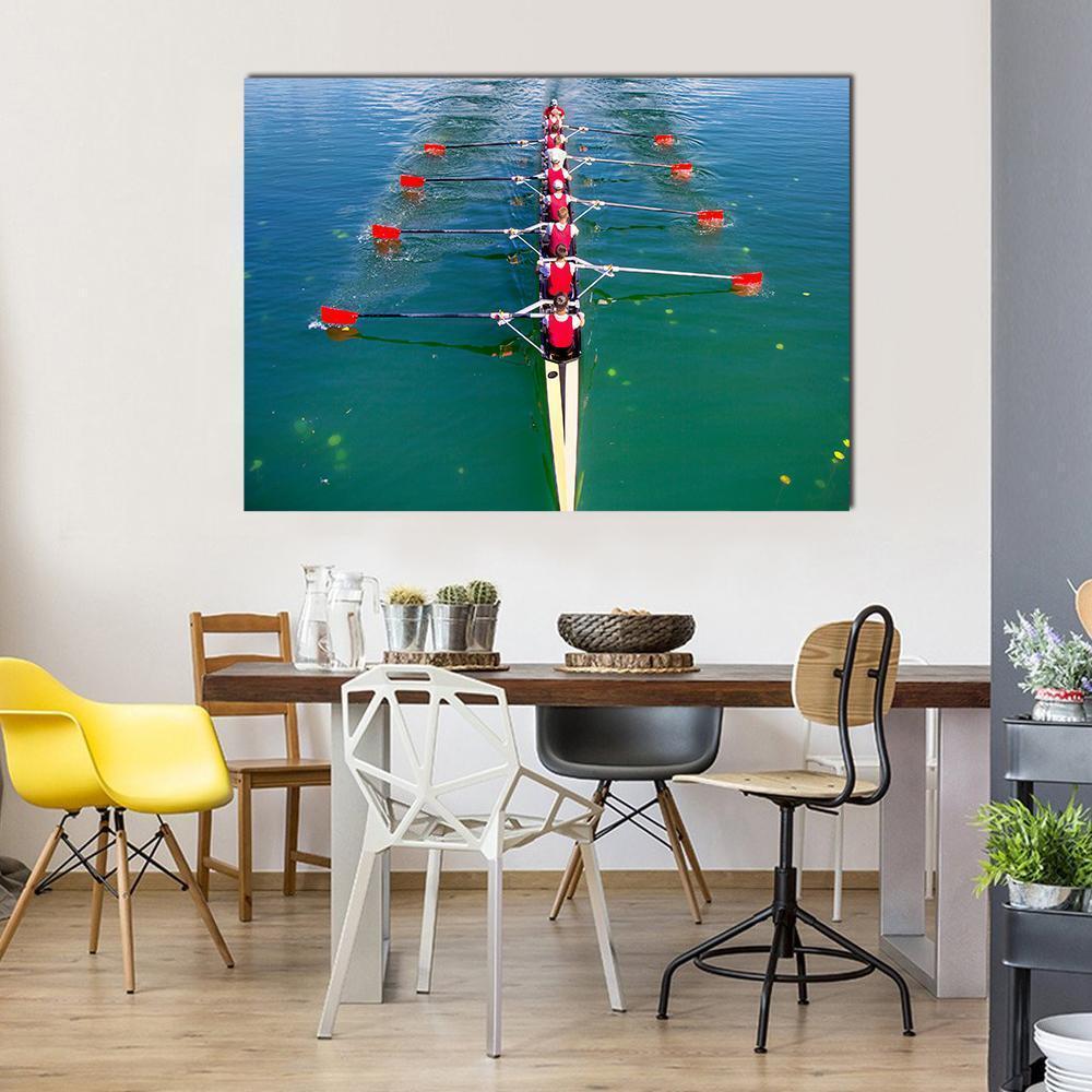 Eight Rowers Competing on Blue Water Canvas Wall Art in red, green and blue, single panel hung on a wall