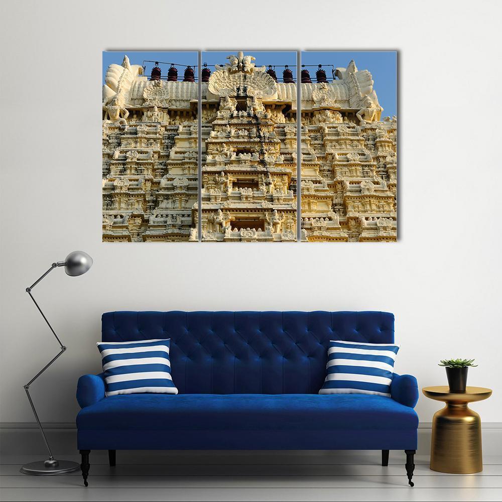 Ekambareswarar Temple Ornate Facade Canvas Wall Art in beige, yellow and blue, 3 panel horizontal set hung on a wall