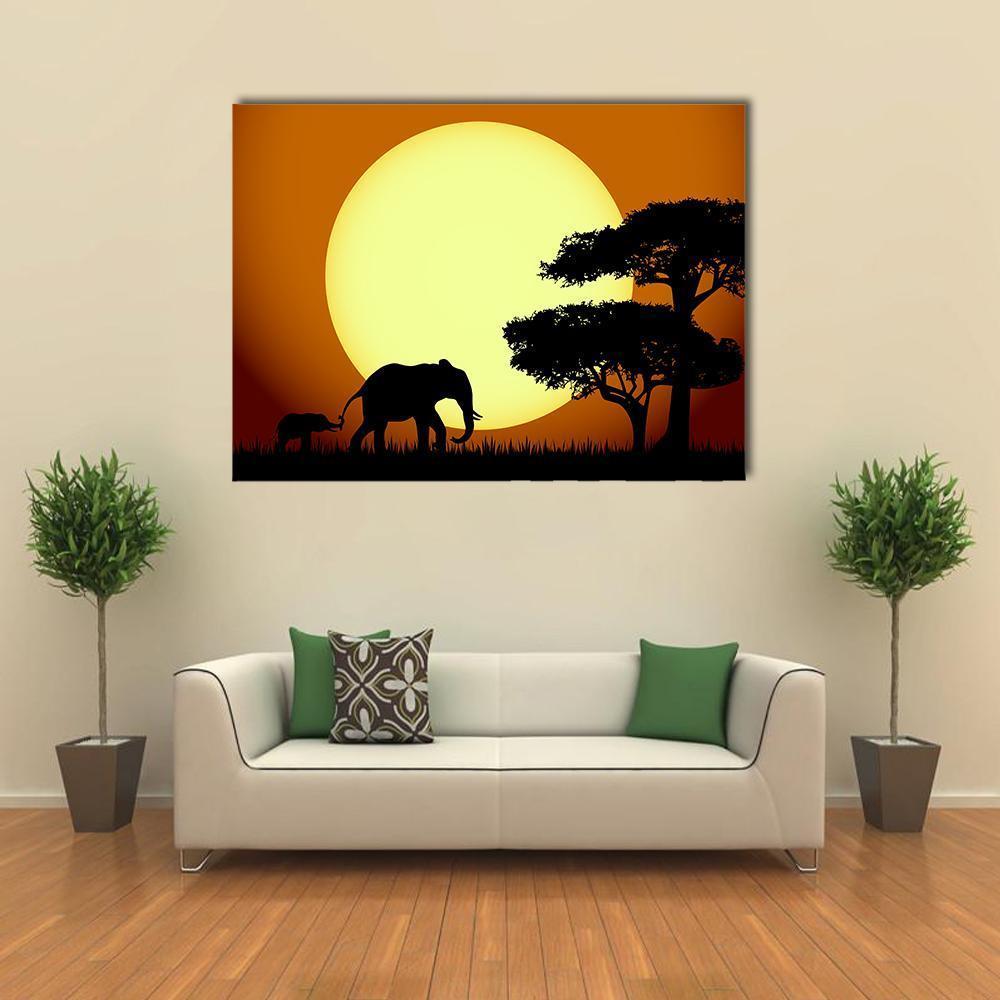 Elephants at Sunset Canvas Wall Art in black, orange and yellow, single panel hung on a wall