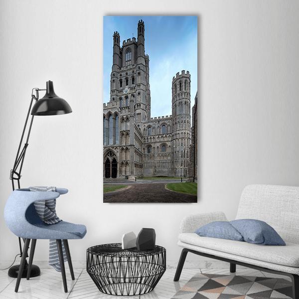 Ely Cathedral Gothic Towers Vertical Canvas Wall Art in gray, brown and blue, single vertical panel hung on a wall
