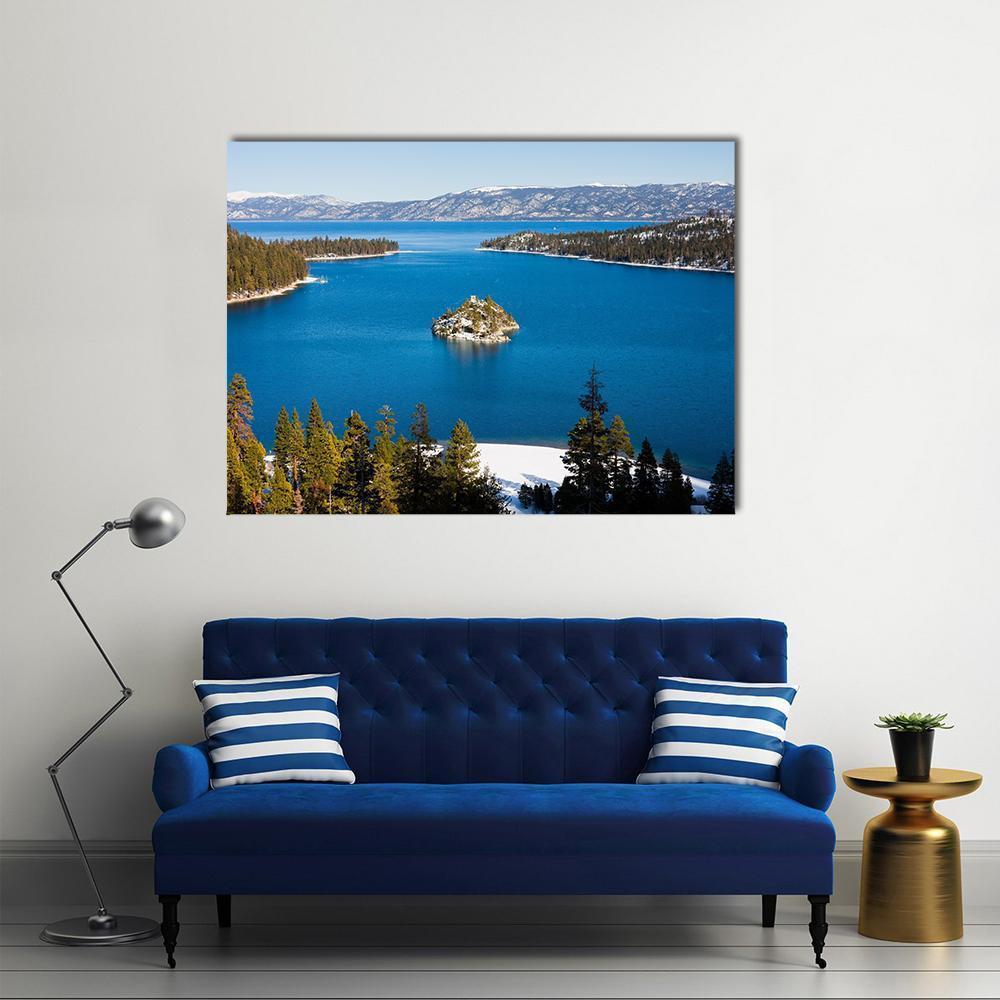 Emerald Bay Winter Scene with Fannette Island Canvas Wall Art in white, green and blue, single panel hung on a wall