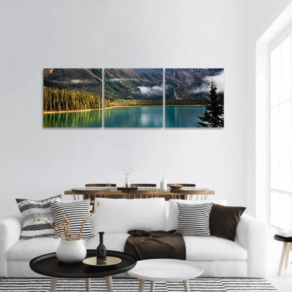 Magic Emerald Lake, Canada Panoramic Canvas Wall Art in brown, green and blue, hung on a wall