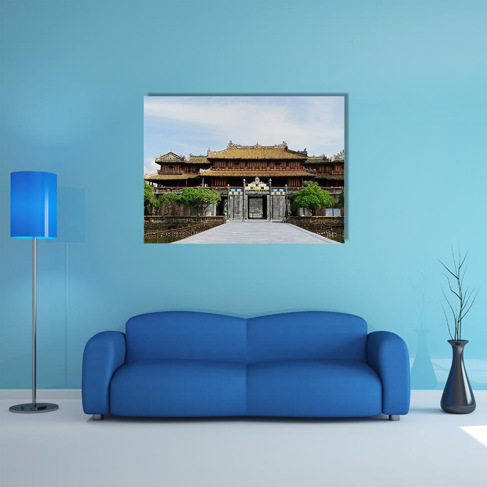 Emperor Palace Complex Canvas Wall Art in gray, yellow and blue, single panel hung on a wall