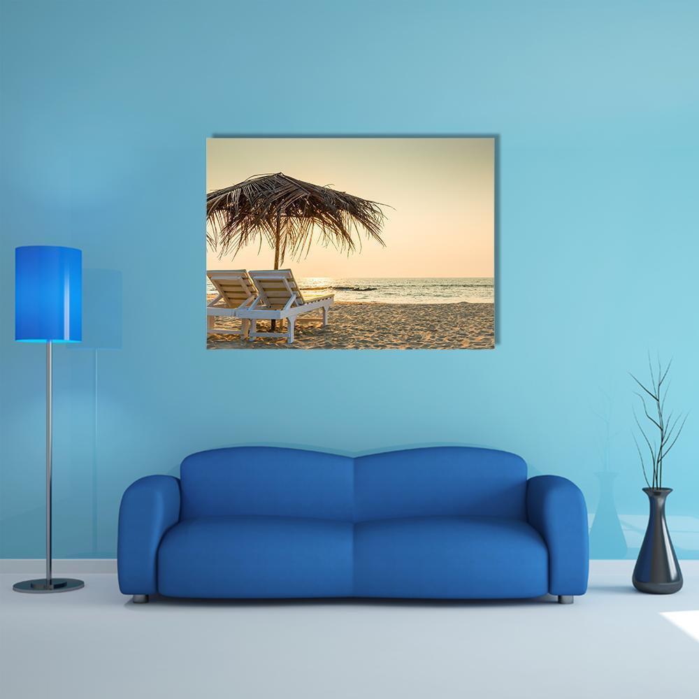 Two White Lounge Chairs with Thatched Umbrella Canvas Wall Art in white, beige and yellow, single panel hung on a wall