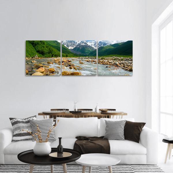 Enguri River, Georgia Panoramic Canvas Wall Art in white, green and blue, hung on a wall
