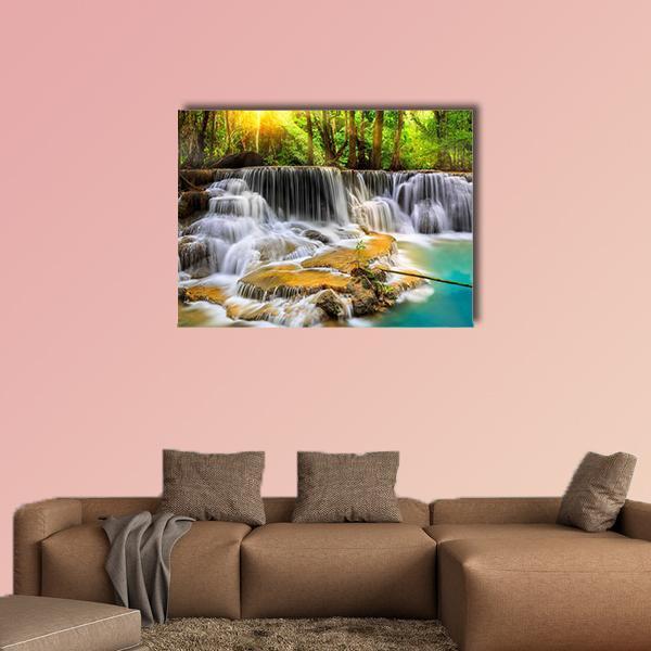 Erawan Waterfall in Thailand Canvas Wall Art in white, brown and green, single panel hung on a wall