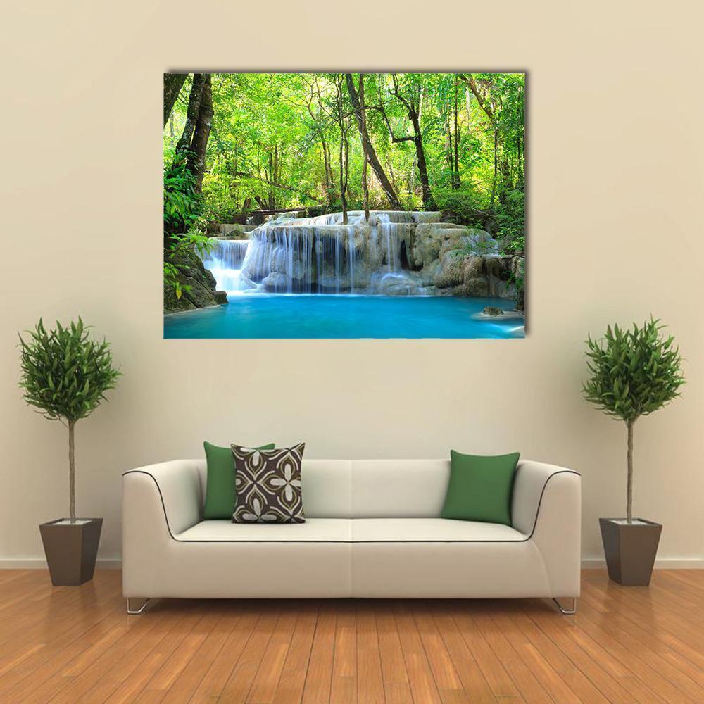 Erawan Waterfall Canvas Wall Art in white, green and blue, single panel hung on a wall