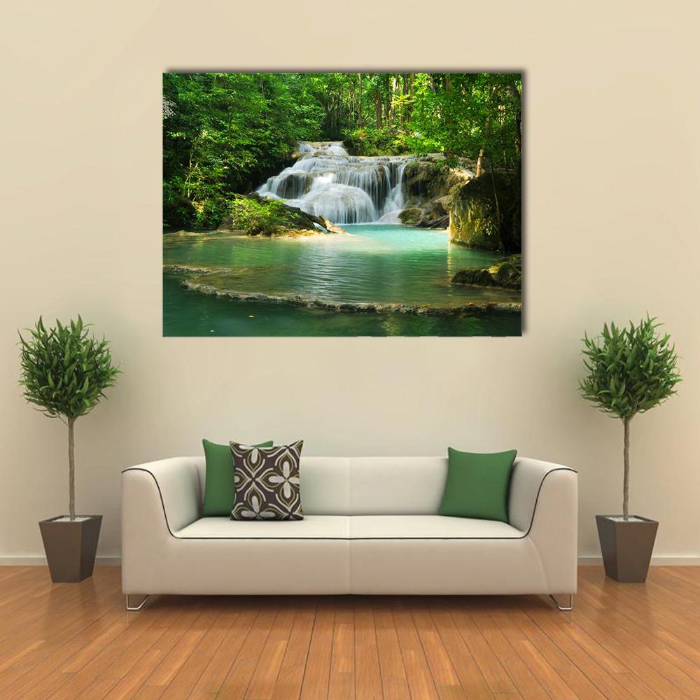 Erawan Tiered Waterfall Thailand Canvas Wall Art in white, green and blue, single panel hung on a wall