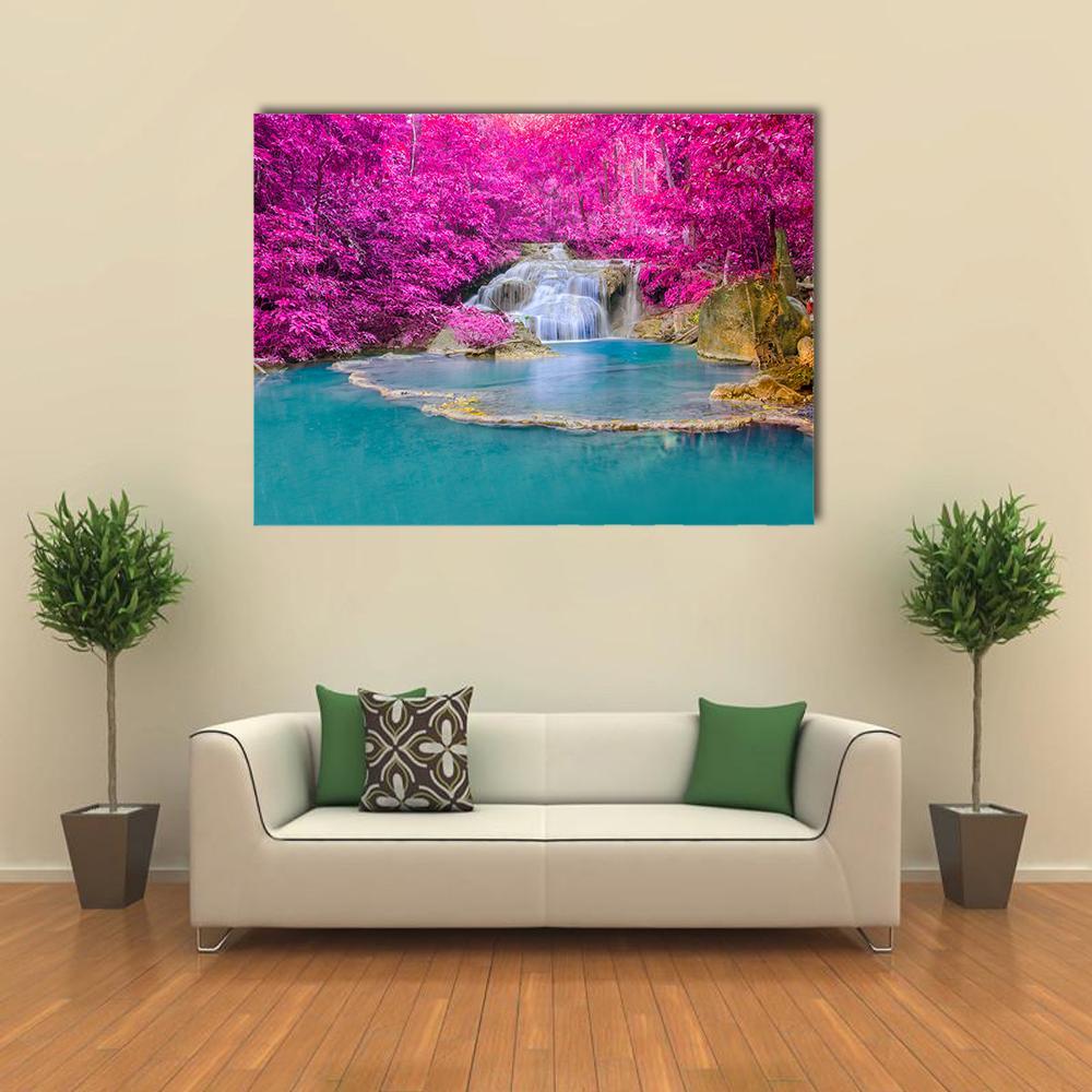 Erawan Waterfall Thailand Canvas Wall Art in blue, purple and pink, single panel hung on a wall