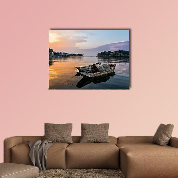 Erhai Lake Sunset with Wooden Boats Canvas Wall Art in orange, yellow and blue, single panel hung on a wall