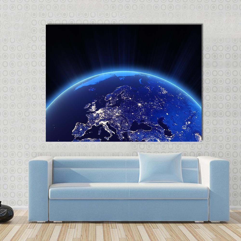 Europe from Space Canvas Wall Art in black and blue, single panel hung on a wall
