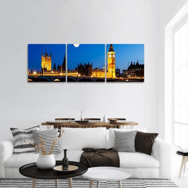 Moon Above Big Ben, London Panoramic Canvas Wall Art in black, yellow and blue, hung on a wall
