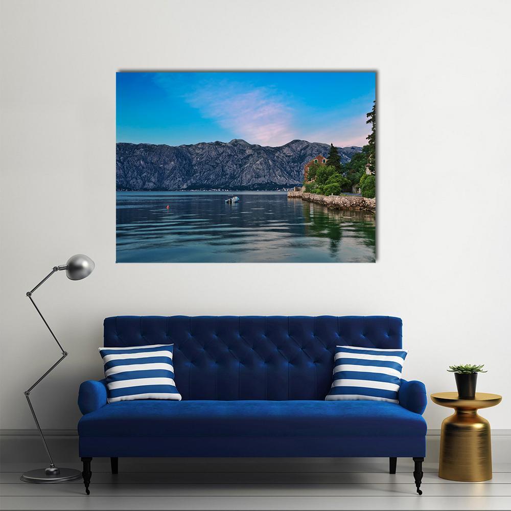 Seaside Town at Dusk Canvas Wall Art in gray, blue and pink, single panel hung on a wall