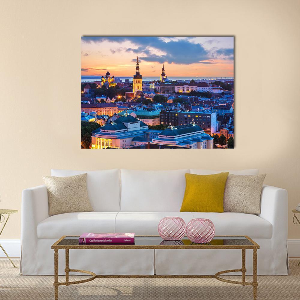 Evening Panorama of Tallinn Canvas Wall Art in orange, yellow and blue, single panel hung on a wall