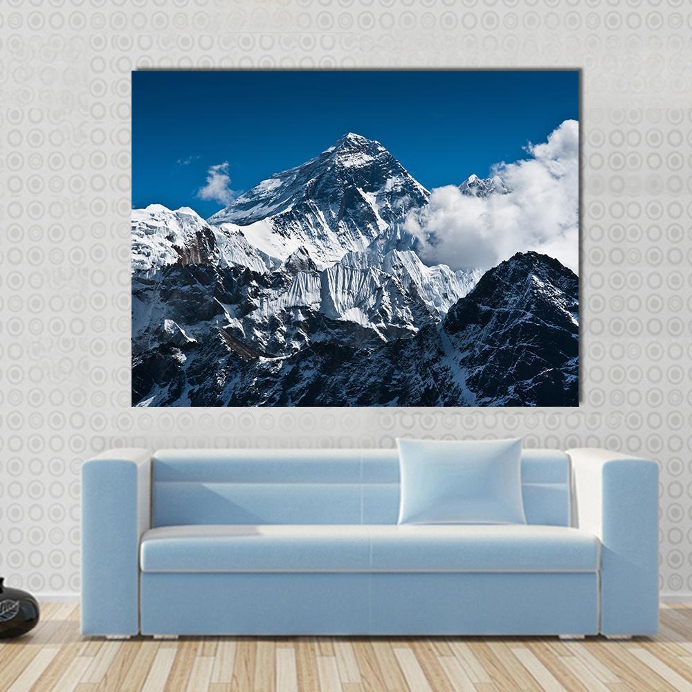 Everest Mountain Peak Canvas Wall Art in black, white and blue, single panel hung on a wall