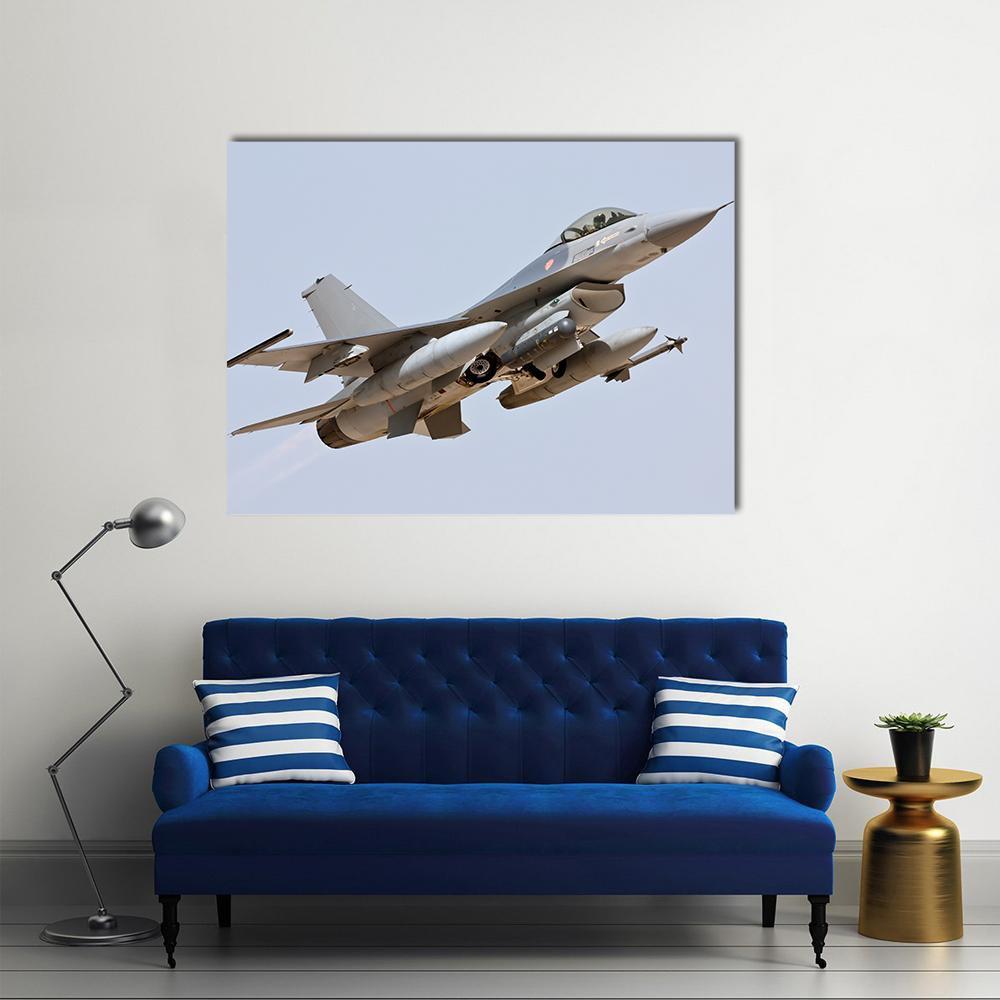 F-16 Takeoff with Missiles Canvas Wall Art in gray and blue, single panel hung on a wall
