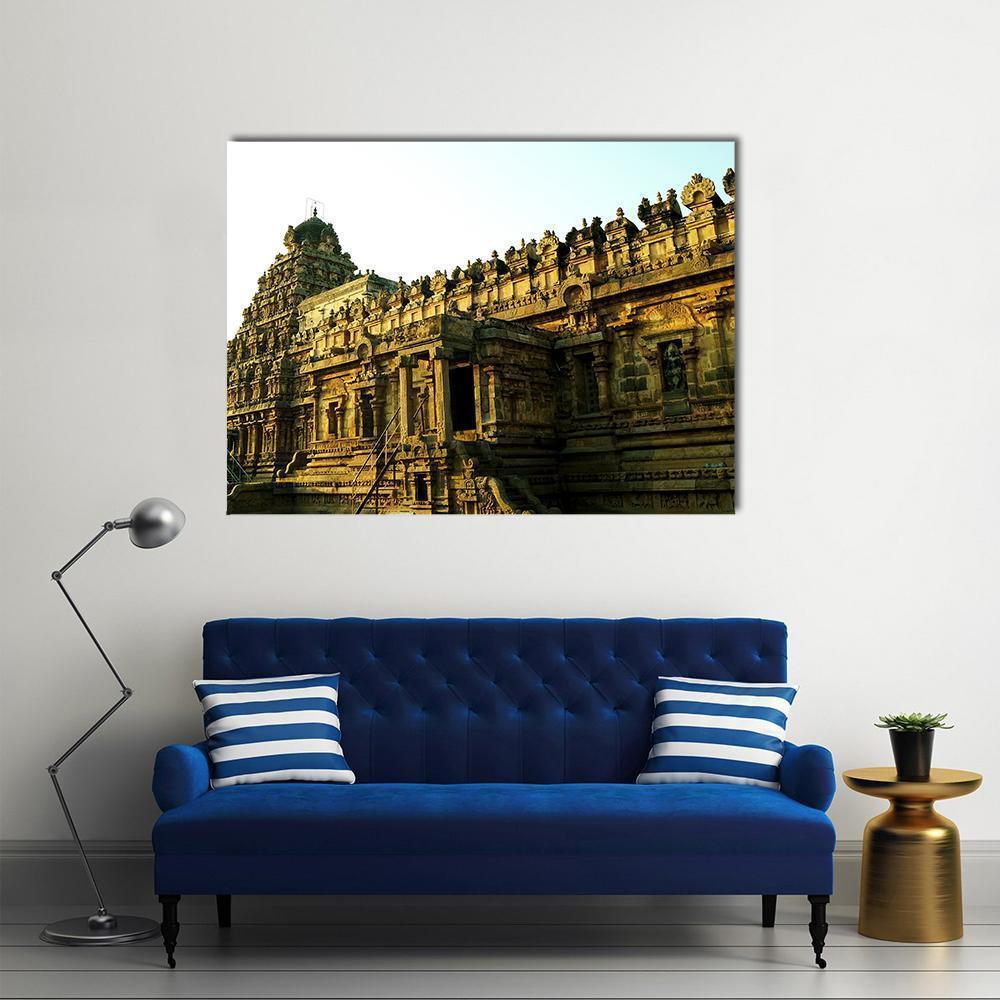 Sunlit Dravidian Temple Facade Canvas Wall Art in beige, brown and gold, single panel hung on a wall