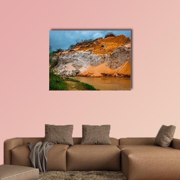 Fairy Stream Vietnam Canvas Wall Art in brown, orange and blue, single panel hung on a wall