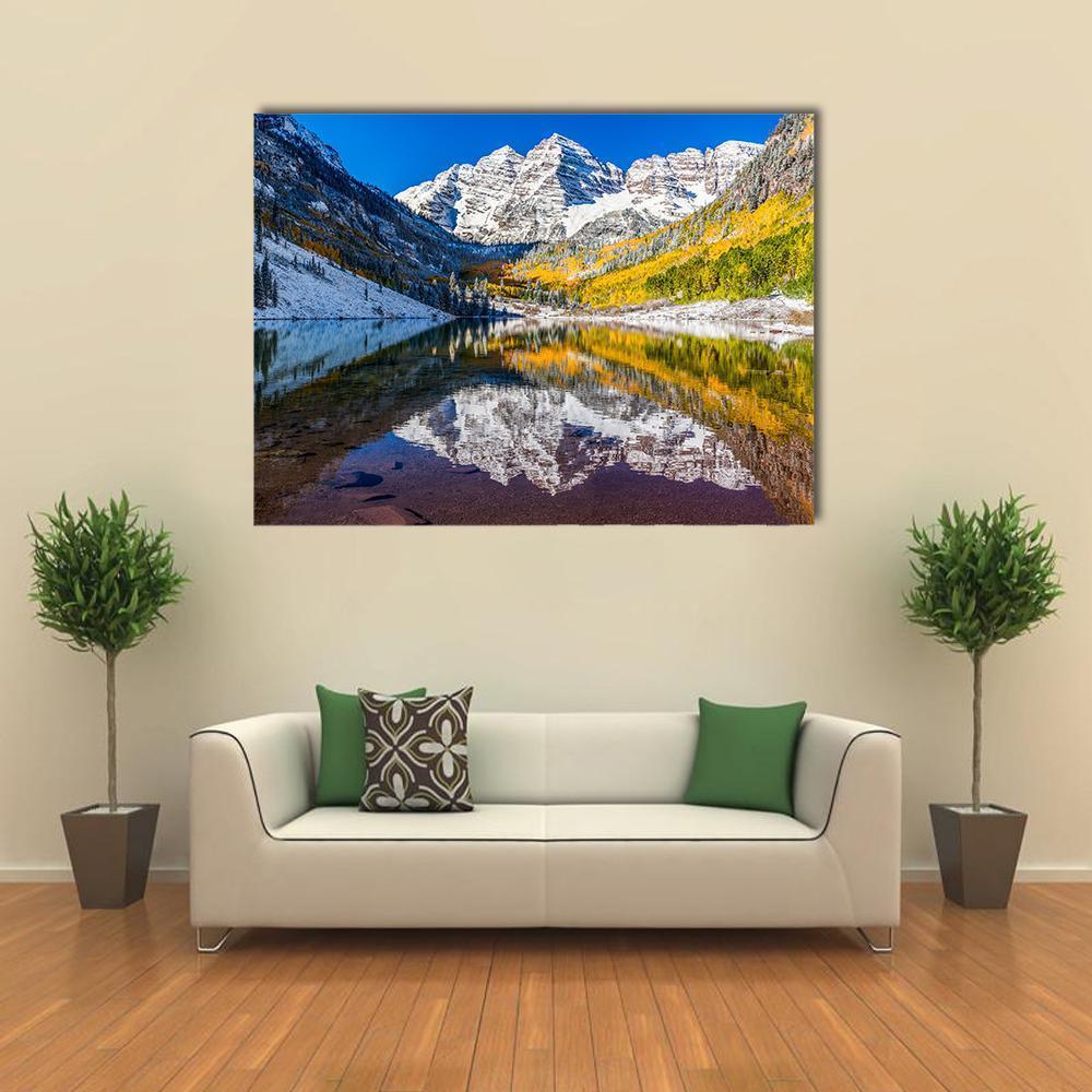 Tranquil Fall Foliage at Maroon Bells Canvas Wall Art in white, yellow and blue, single panel hung on a wall
